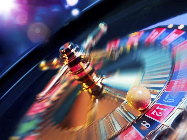 high contrast image of casino roulette in motion