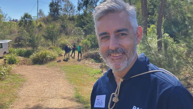 RACQ Foundation advocacy general manager Josh Cooney said the workers were going to “smash” the target of planting 3000 trees and shrubs across three days.