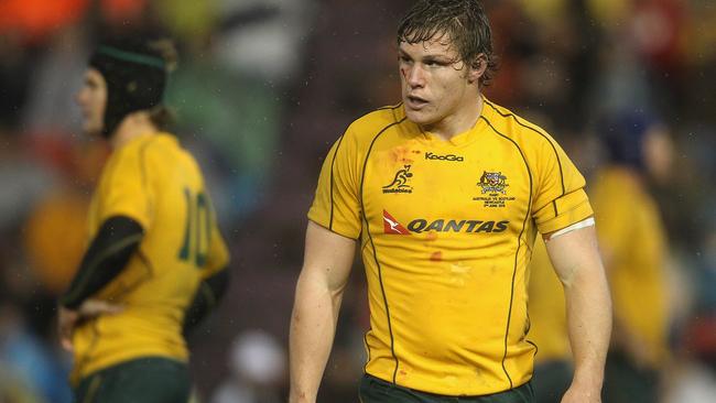 A soaked Michael Hooper during his debut Test against Scotland in 2012. Picture: Getty Images