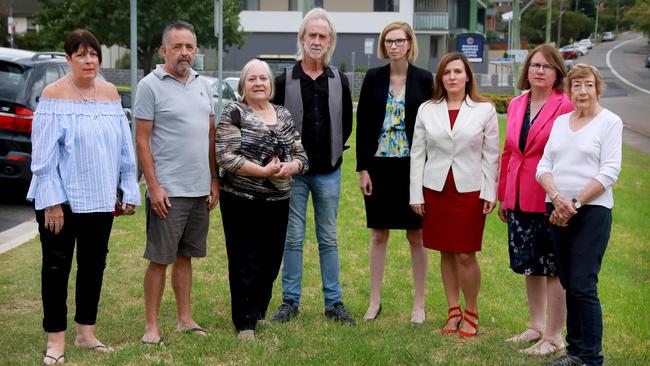 Concerned locals Sue Dodds, Mark Dodds, Liz Ashard, Jeff O'kell with Labor candidate for Parramatta Liz Scully, Labor Planning spokeswoman Tania Mihailuk, Parramatta councillor Donna Davis and Alison Gordon in Telopea. (AAP IMAGE/ Angelo Velardo)