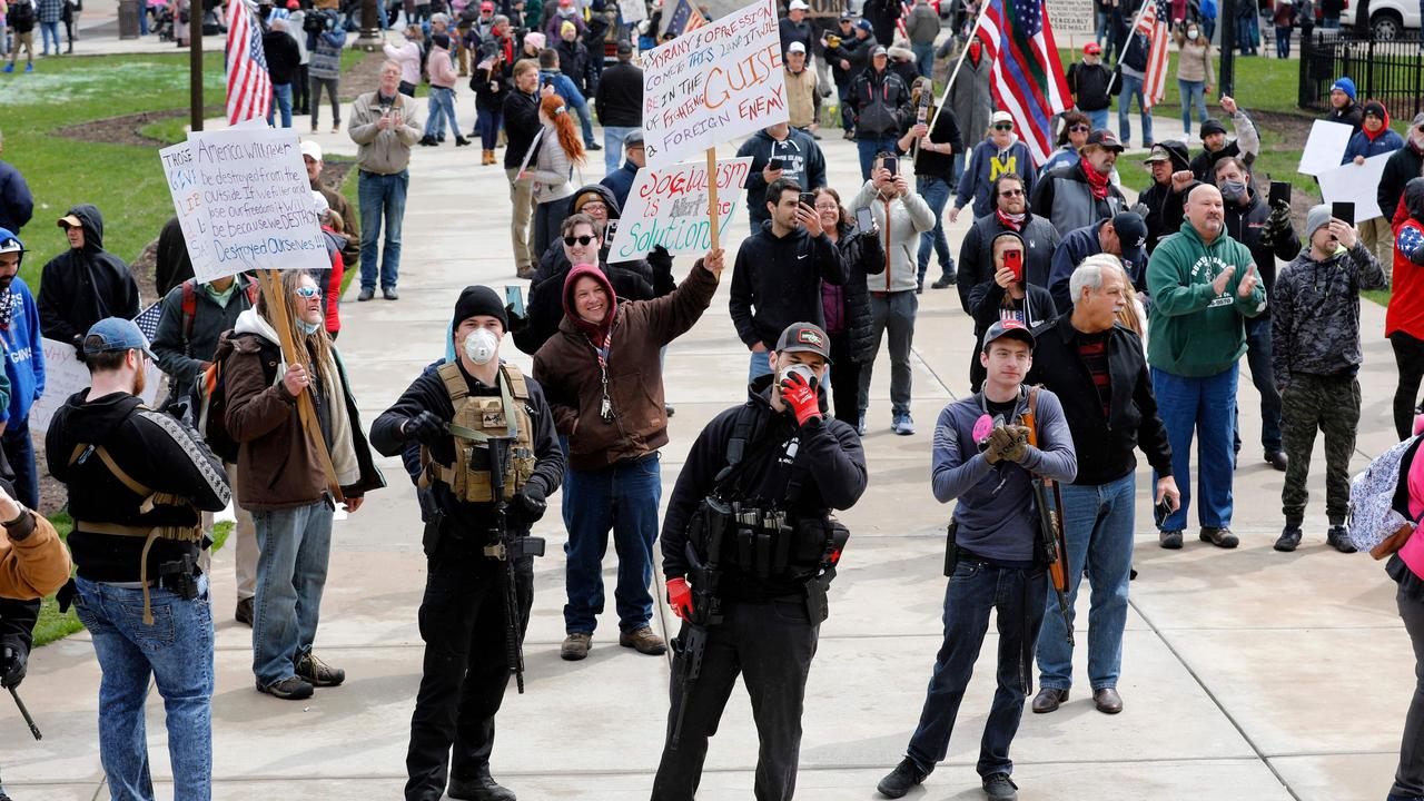 Michiganders Against Excessive Quarantine converge on the capital to protest bans on visiting family or seeing neighbours. Picture: Jeff Kowalsky