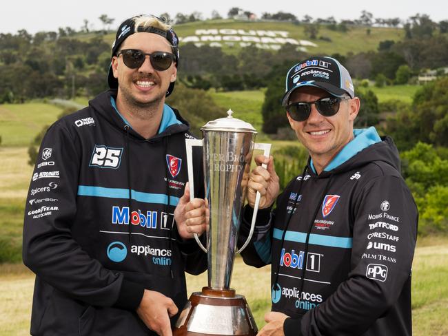 Chaz Mostert and Lee Holdsworth pose with the Peter Brock Trophy after winning the 2021 Bathurst 1000. Picture: Getty Images