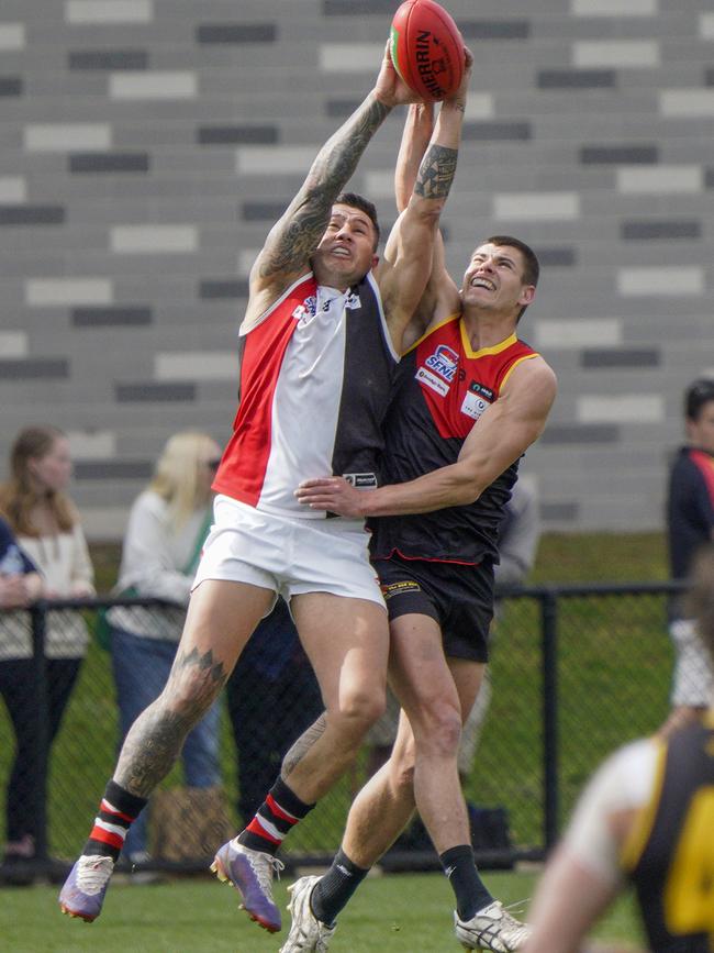 SFL: Aaron Edwards marks for St Kilda City. Picture: Valeriu Campan