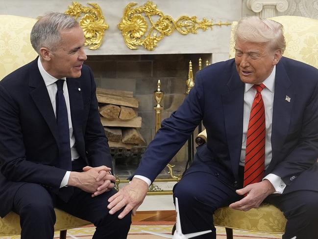 Canada Prime Minister Mark Carney and U.S. President Donald Trump engage in a meeting at the White House. Picture: Adrian Wyld/The Canadian Press via AP