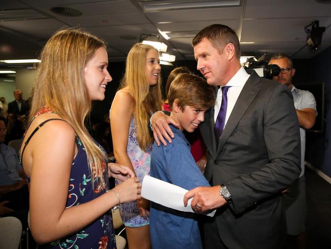 Premier Mike Baird with his family yesterday. Picture: Ryan Osland