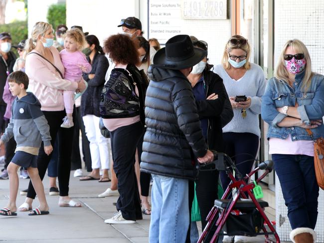 People queue for Covid-19 test at Sullivan Nicolaides Caloundra, after two Covid positive people Arrived in Queensland and crossed the border at Goondiwindi and went to the Sunshine Coast, on Thursday 10th June 2021, Photo Steve Pohlner