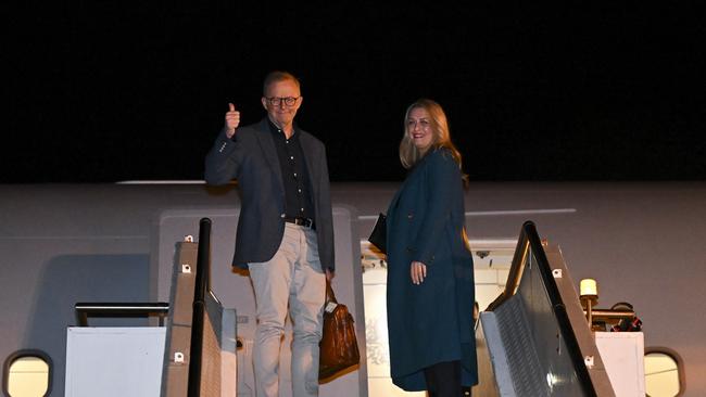 Prime Minister Anthony Albanese and partner Jodie Haydon board their plane to Europe for a NATO leaders’ summit. Picture: AAP Image/Lukas Coch