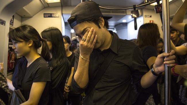 Grief on a Bangkok train.