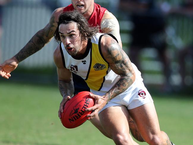 Round 4 QAFL Australian rules game between Surfers Paradise Demons (blue) and Labrador Tigers at Sir Bruce Small Park. Photo of Alex McKay. Photo by Richard Gosling