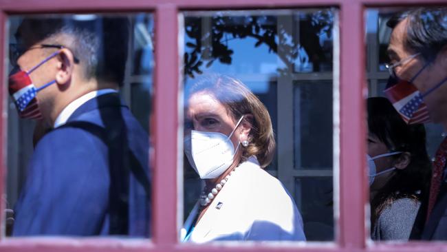 Speaker of the US House Of Representatives Nancy Pelosi, centre, arrives at the Legislative Yuan, Taiwan's house of parliament last week. Picture: Getty Images