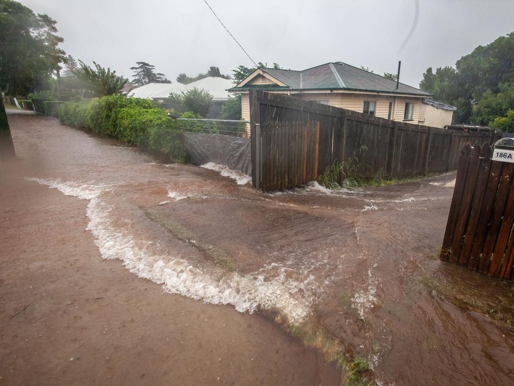 Flooding at the intersection of West and Drayton roads, Toowoomba. Picture: David Martinelli