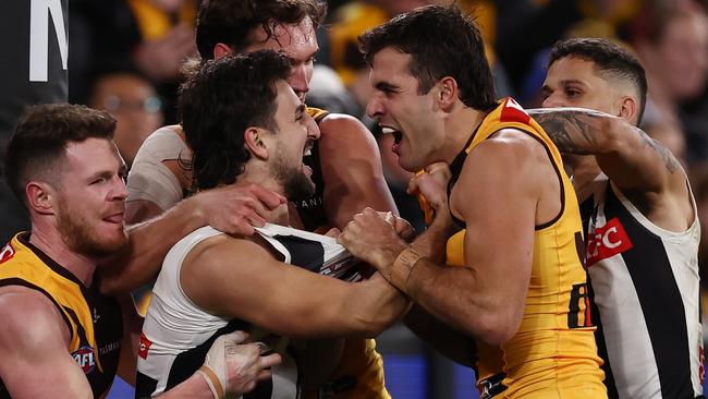 MELBOURNE, AUSTRALIA - August 5 , 2023. AFL .        Josh Daicos of the Magpies and Finn Maginness of the Hawks go at it during the round 21 match between the Hawthorn and Collingwood at Marvel Stadium in Melbourne.   Photo by Michael Klein.