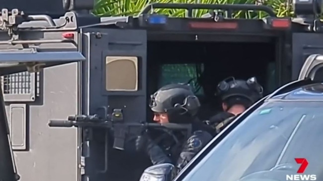 STAR Group officers during the horror suburban siege. Picture: 7News