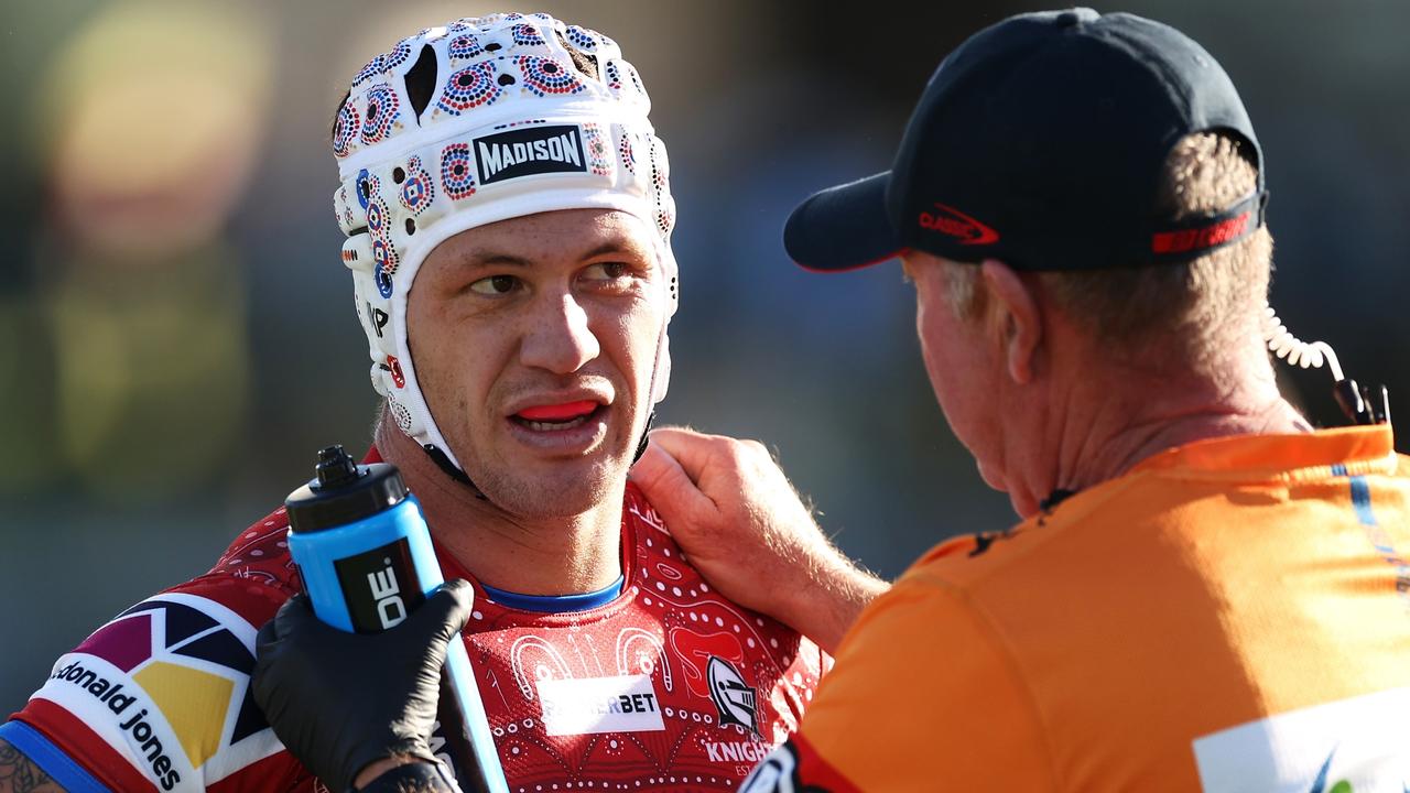 Kalyn Ponga of the Knights receives attention from the trainer during the round 12 NRL match between Cronulla Sharks and Newcastle Knights at Coffs Harbour International Stadium on May 20, 2023 in Coffs Harbour, Australia. (Photo by Mark Kolbe/Getty Images)