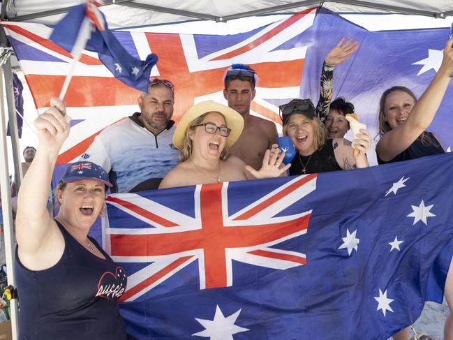 Australia day on the beach at Aldinga . L-R Chrissy Hollis, Colin ,Melanie and Tyson Hewetson, Danielle Maple, Nicole Horsey and Daryl Atkins. 26th January 2024 Picture: Brett Hartwig