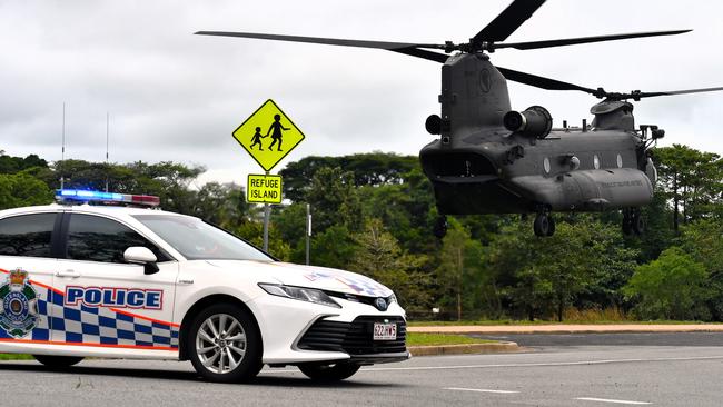 A Singapore Air Force CH-47F Chinook Helicopter landing outside Ingham State High School on Sunday. The floods in Hinchinbrook Shire, North Queensland. Picture: Cameron Bates