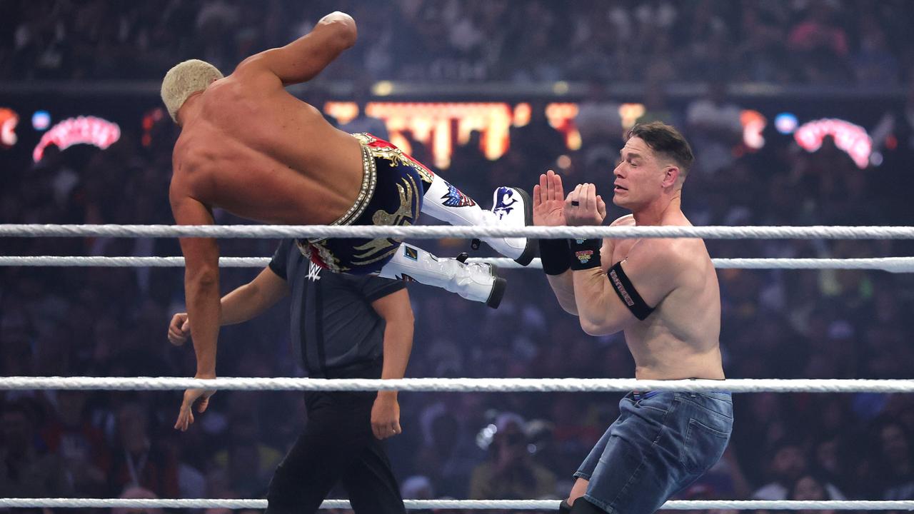 John Cena (right) in action against Cody Rhodes. (Photo by Ethan Miller/Getty Images)