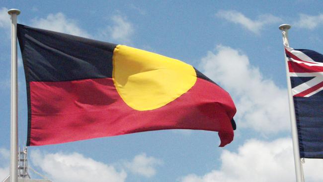 Brisbane, January 26, 2003.  Reconciliation was the theme of Australia Day in Queensland as the Aboriginal and Torres Strait Islander flags took an equal role with the Australian flag.  (AAP Image/Vera Devai) NO ARCHIVING