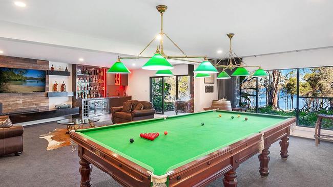 Because every home needs its own billiards room and sports bar. Picture: realestate.com.au