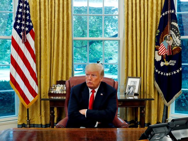 U.S. President Donald Trump reacts to a question during an interview with Reuters in the Oval Office of the White House in Washington, U.S. August 20, 2018.  REUTERS/Leah Millis TPX IMAGES OF THE DAY - RC187D452530