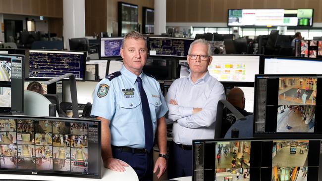 Superintendent Andrew Evans and Head of Security and Intelligence Sydney Trains, Sean Godwin inside the Rail Operations Centre at Alexandria. Picture: Jane Dempster