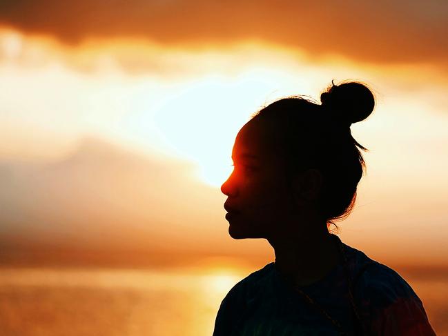 Silhouette of a woman during sunset. Picture: Rendy Novantino