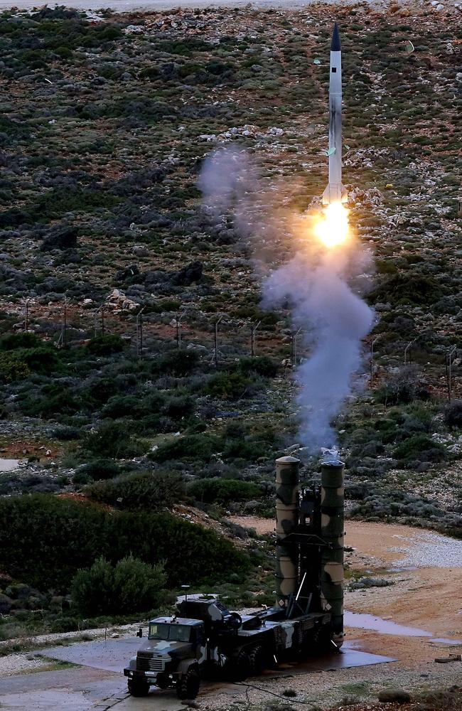 An S-300 PMU-1 anti-aircraft missile launches during a Greek army military exercise near Chania on the island of Crete on December 13, 2013. Greece is the first NATO country to try the Russian long-range missile system. Picture: AFP