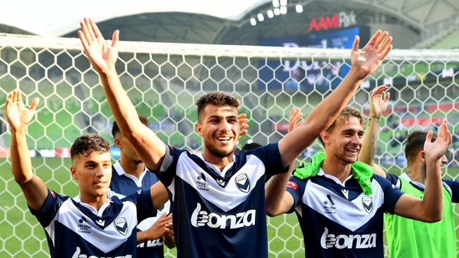 Zinedine Machach (centre) is happy to be back for the A-League grand final. Picture: Josh Chadwick/Getty Images