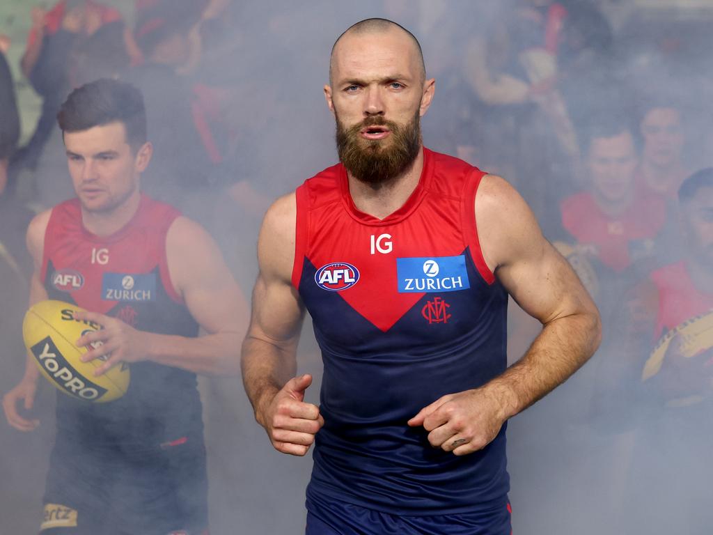 MELBOURNE, AUSTRALIA – AUGUST 10: Max Gawn of the Demons leads his team onto the field during the round 22 AFL match between Melbourne Demons and Port Adelaide Power at Melbourne Cricket Ground, on August 10, 2024, in Melbourne, Australia. (Photo by Josh Chadwick/Getty Images)