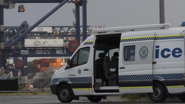 Police at Port Botany last week when a passenger was evacuated from the virus-riddled Ruby Princess cruise ship. Picture: Brook Mitchell/Getty