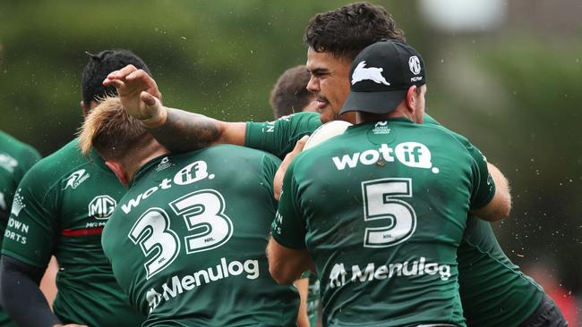 Tensions boiled over after Latrell Mitchell put a fend on Jacob Host (wearing jersey 33). Picture: Getty Images.