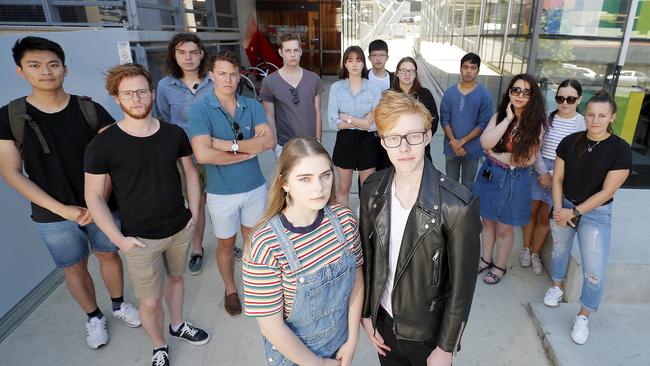 Some of the students who have been affected by the University of Tasmania’s proposed changes to its accommodation outside the university’s Melville Street apartments. Picture: RICHARD JUPE