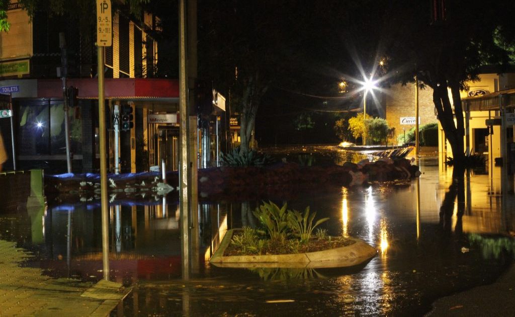 The levee at about 10:30 pm Monday night after suffering a breach. Photo: Robyne Cuerel / Fraser Coast Chronicle. Picture: Robyne Cuerel