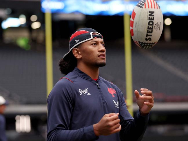 LAS VEGAS, NEVADA - MARCH 01: Sitili Tupouniua of the Sydney Roosters tosses the ball during a Sydney Roosters NRL Captain's Run at Allegiant Stadium, on March 01, 2024, in Las Vegas, Nevada.   Ezra Shaw/Getty Images/AFP (Photo by EZRA SHAW / GETTY IMAGES NORTH AMERICA / Getty Images via AFP)