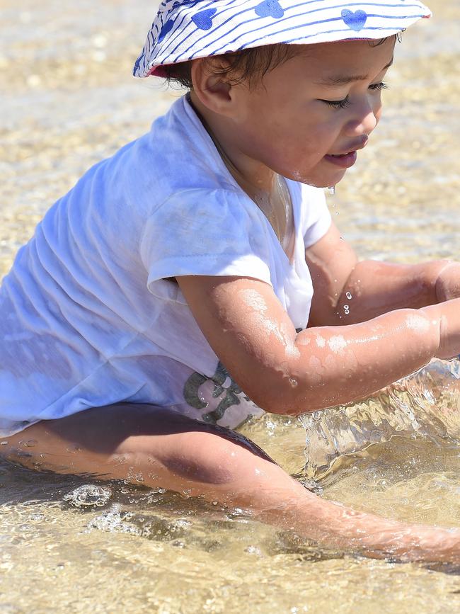 Myone, 2, likes water play. Picture: Lawrence Pinder