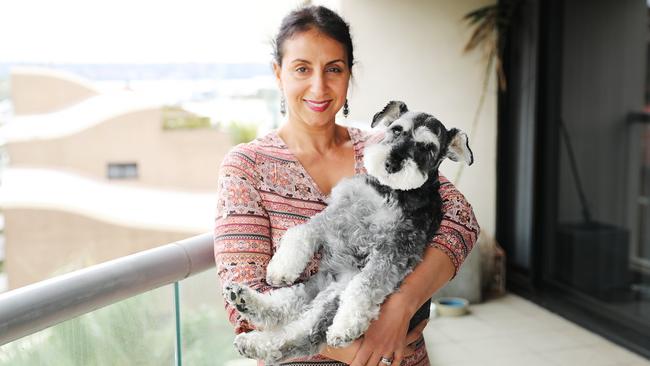 Jazz singer Jo Cooper with Angus at the Horizon Building in Darlinghurst. Picture: Rohan Kelly