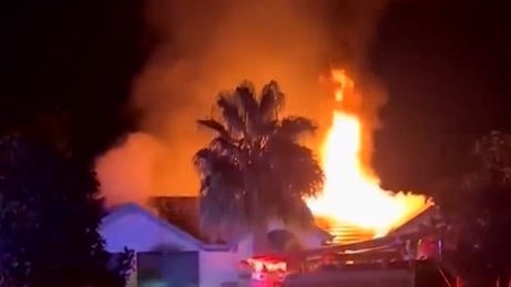 Residents have fled a massive blaze that destroyed a Paralowie home. Picture: 7NEWS