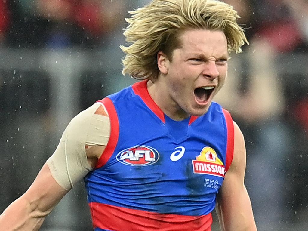 LAUNCESTON, AUSTRALIA - AUGUST 29: Cody Weightman of the Bulldogs celebrates kicking a goal during the AFL First Elimination Final match between Western Bulldogs and Essendon Bombers at University of Tasmania Stadium on August 29, 2021 in Launceston, Australia. (Photo by Steve Bell/AFL Photos/via Getty Images)
