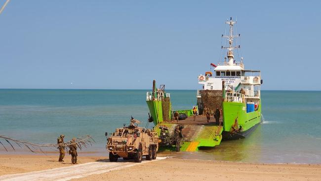 Soldiers from Darwin's 8/12 Regiment conduct littoral training on Dundee Beach, Northern Territory.