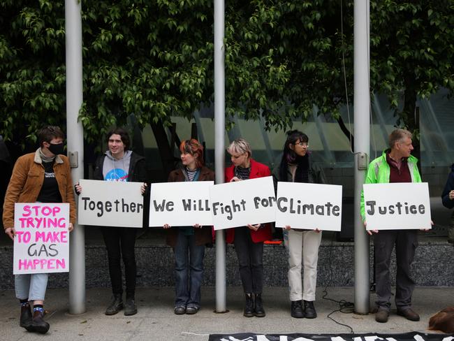 MELBOURNE, AUSTRALIA - NOVEMBER 15: Protesters gather at the front of the Federal Court Of Australia on November 15, 2022 in Melbourne, Australia. The Federal Court is hearing an appeal by Santos Ltd., which seeks to restart drilling in the Barossa Gas project, located near the Tiwi Islands off the northern coast of Australia. Courts had earlier ruled the approval for drilling in the project as invalid. (Photo by Tamati Smith/Getty Images)