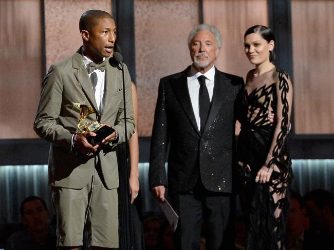 He’s happy all right ... Pharell Williams accepts the Best Pop Solo Performance. Picture: Kevork Djansezian/Getty Images