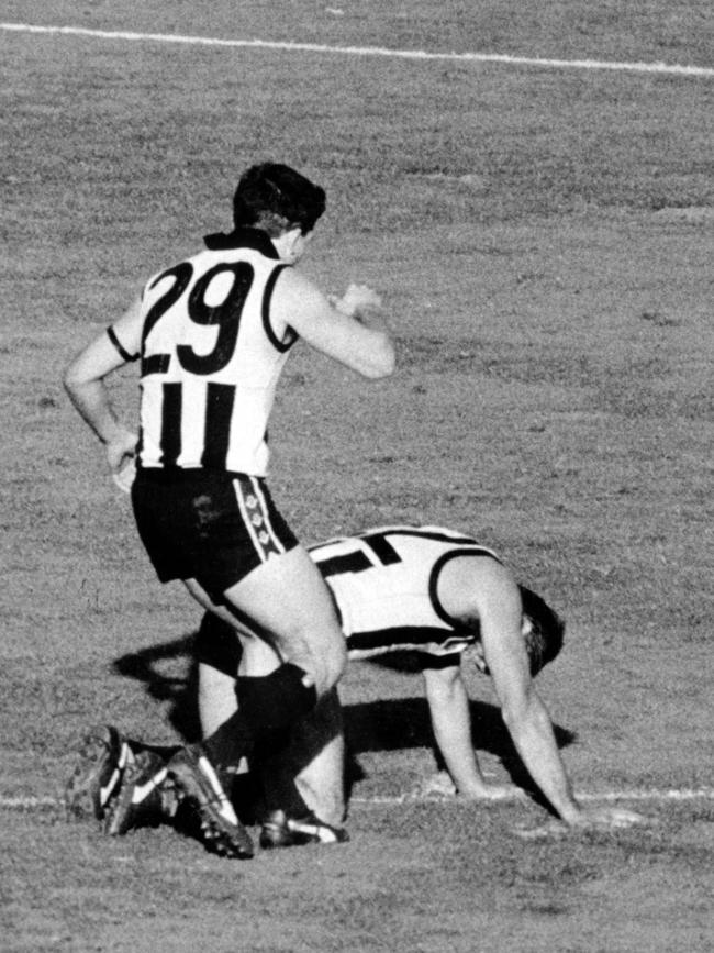 Scott Russell rushes to Tony Shaw to begin the premiership celebrations.