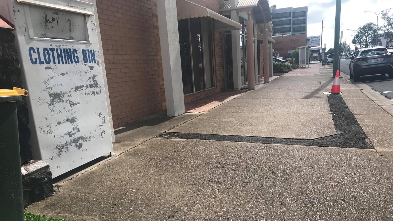 Bundaberg Police are investigating after a metal manhole cover was thrown through the window of a local op shop.