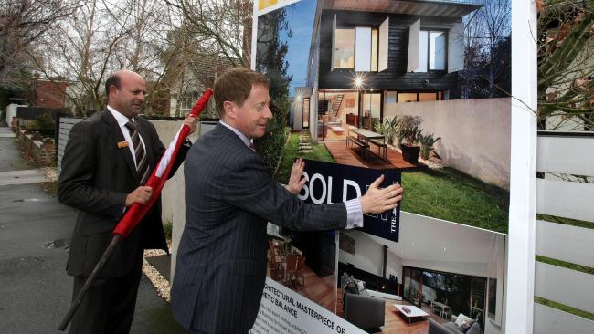 Auctioneer Phillip Kingston sells a home in St Kilda East, Melbourne, yesterday as the Australian property market finally seems to be cooling off. Picture: Stuart McEvoy