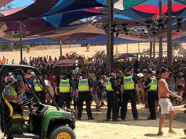 Medics and police responding to an incident at the festival. 