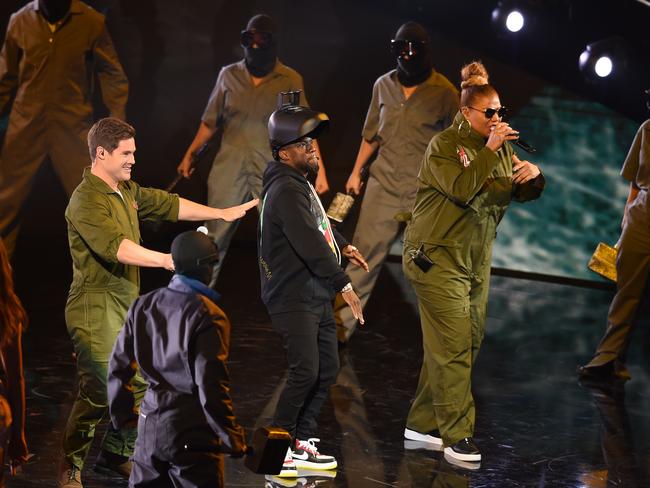 Adam Devine, Kevin Hart and Queen Latifah. / AFP PHOTO / Robyn Beck