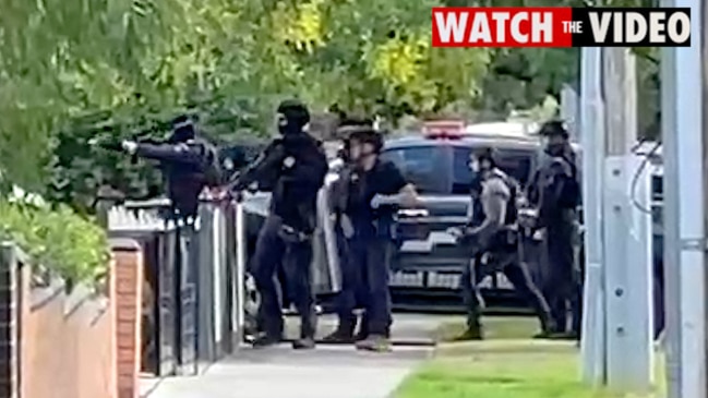 Critical incident response team entering a property in Reservoir