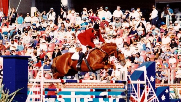 Equestrian Anthony Thomas and his previous horse, Fluke, in action.