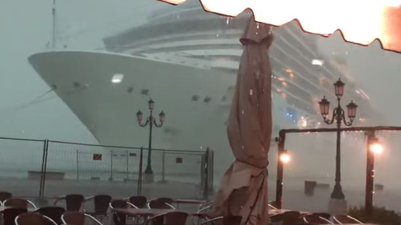 The ship came in to the Venice port during a storm.