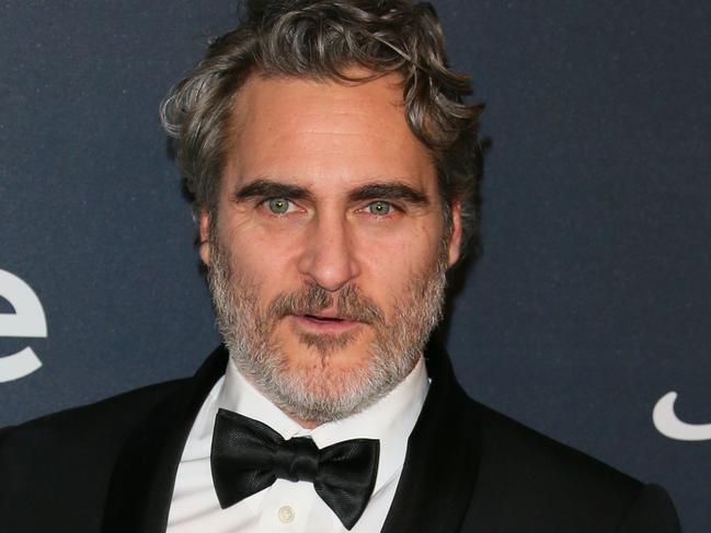 US actor Joaquin Phoenix poses with his award for Best Performance by an Actor in a Motion Picture - Drama as he attends the 21st Annual InStyle And Warner Bros. Pictures Golden Globe After-Party in Beverly Hills, California on January 5, 2020. (Photo by Jean-Baptiste LACROIX / AFP)